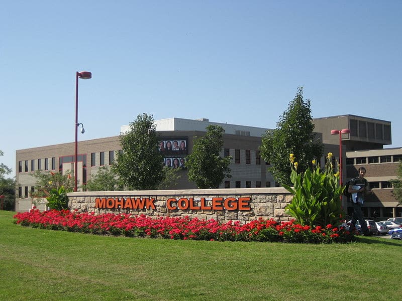A building with a sign that says "Mohawk College.